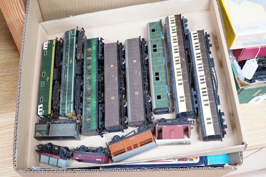 A quantity of 00 gauge railway by various makes, comprising; nine locomotives by Tri-ang, Hornby Dublo, etc. (one missing tender), sixteen maroon bogie coaches and eighteen freight wagons